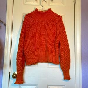 H&M Orange turtleneck chunky knit sweater.